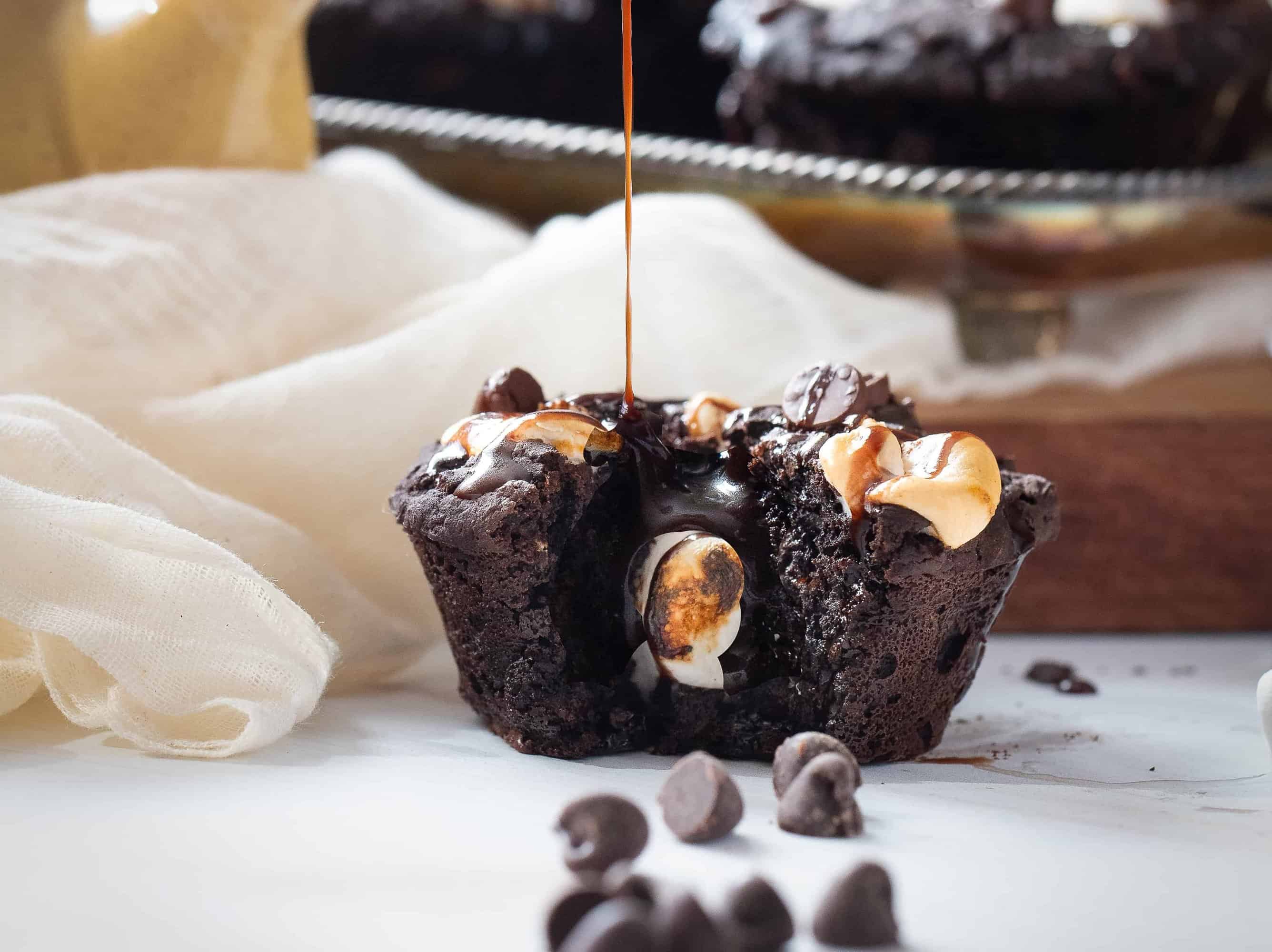 S'more muffin being drizzled with chocolate