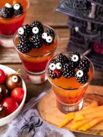 vegan jello topped with blackberry's with googly eyes
