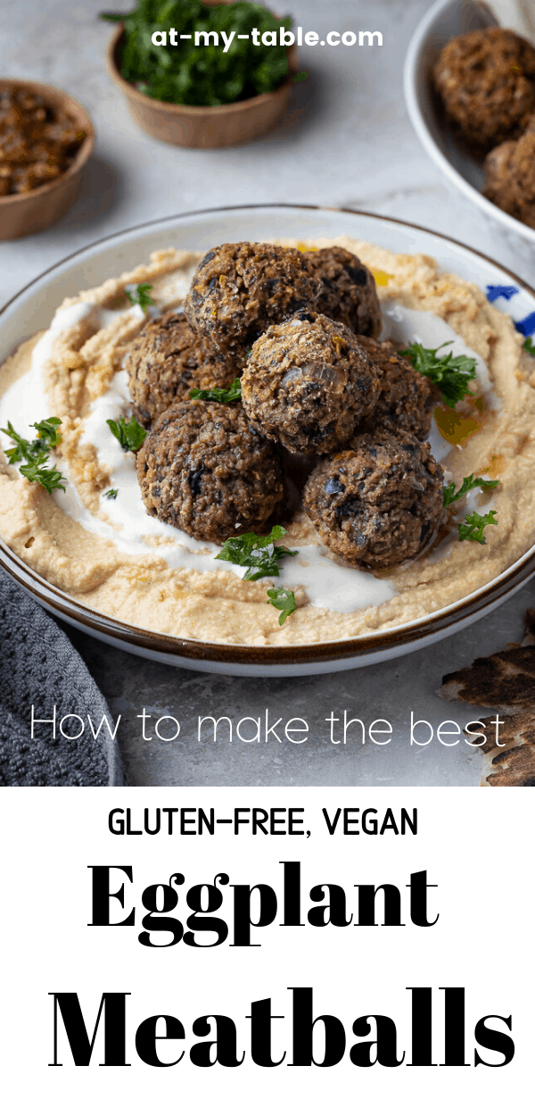 Bowl of hummus topped with eggplant meatballs and tahini with text overlay for Pinterest