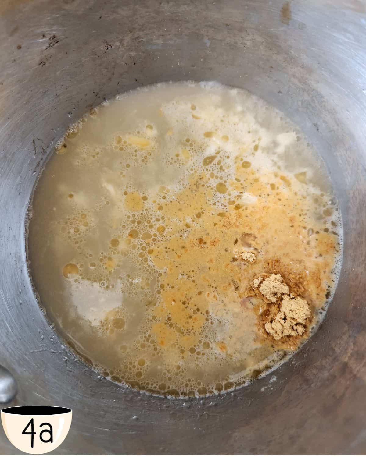 Image of a bowl with Chinese General Tso sauce being mixed together.