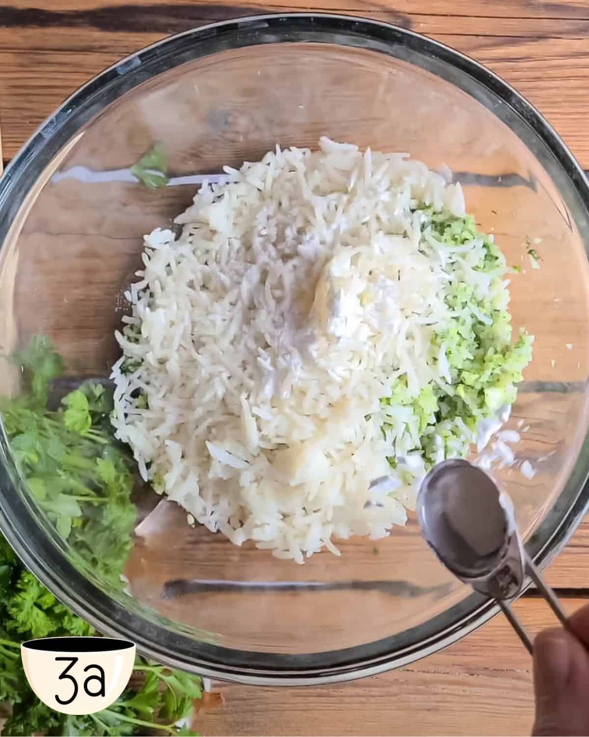 A bowl of the blended rice mixture with the additonal cooked rice and flour added in.
